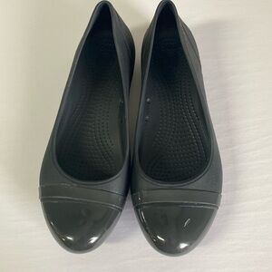 Charcoal gray/black Crocs flats